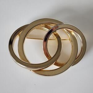 Vintage 80's gold tone 3 ring intertwined pin brooch‎